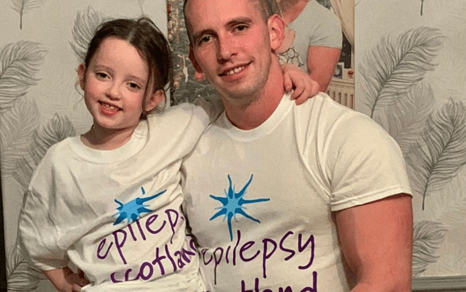 Philip and his daughter wearing Epilepsy Scotland t-shirts