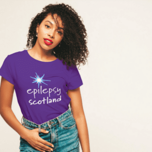 Woman wearing purple Epilepsy Scotland t-shirt